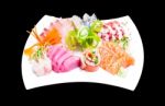 Mixed Sashimi In White Plate Isolated On Black Background,with C Stock Photo