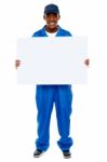 African Guy Showing White Board Stock Photo