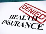 Health Insurance Denied Stamp Stock Photo