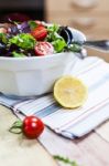 Mixed Vegetable Salad With Tomatoes And Lemon Stock Photo