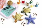 Starfish, Turtle Doll Made Of Cloth Stock Photo