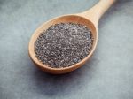 Nutritious Chia Seeds In Wooden Spoon For Diet Food Ingredients Stock Photo