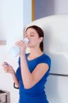 Woman Drinking Milk Stock Photo