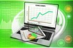 Laptop Showing A Spreadsheet And A Paper With Statistic Charts Stock Photo