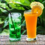 Green Soda And Orange Juice Stock Photo