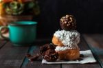 Donuts And Chocolate On The Wooden Stock Photo