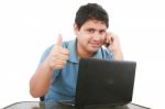 Guy With Laptop And Thumbs Up Stock Photo