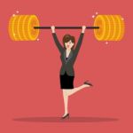 Business Woman Lifting A Heavy Weight Stock Photo