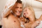 Man Bathing Wife Stock Photo