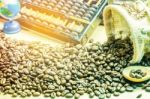 Coffee Beans On The Wooden Stock Photo