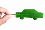 Green Car Cut From Leaf Stock Photo