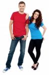 Smiling Young Couple Standing Stock Photo