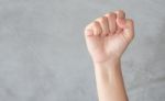 Hand Action Gesture On Grey Background Stock Photo