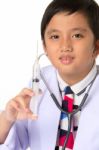 Boy Holding A Syringe Stock Photo
