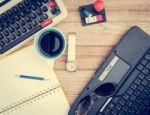 Office Desk With Coffee Background Stock Photo