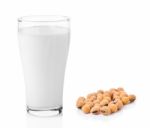 Fresh Milk In The Glass With Soy Beans On White Background Stock Photo
