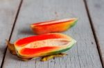 Papaya Of Half On Wooden Stock Photo