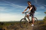 Young Man Riding Mountain Bike Stock Photo