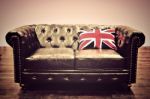 Chesterfield Couch With Union Jack Cushion Stock Photo