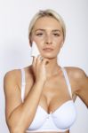 Young Woman Clean Face With Wet Wipes Stock Photo