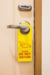 Please Do Not Disturb Sign Hang On Door Knob In Hotel Stock Photo