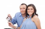 Attractive Hispanic Young Pregnant Couple Expecting A Child Hold Stock Photo