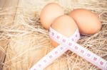 Measurement Tape Wrap Around Eggs, Symbolize Of Healthy Eating Of High Protein Stock Photo