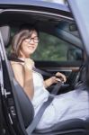 Asian Woman Fasten Car Seat Belt Before Take A Driving Stock Photo