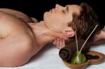 Masseur Doing Neck Massage Stock Photo