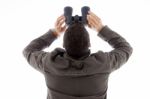 Male Looking Through Binoculars Stock Photo