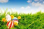 Easter Eggs With Flower On Grass Stock Photo