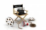 Movie Industry. Producer Chair, Clapper Board And Film Reel Stock Photo