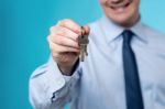 Realtor Giving The Keys To Home Stock Photo