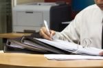 Businessman Writing Work Paper Stock Photo