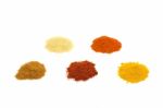 Heaps Of Several Seasoning Spices On White Stock Photo
