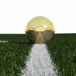 Soccer Pitch With Golden Ball Stock Photo