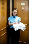 Maid Waiting To Deliver Bathing Kit Stock Photo