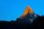 Matterhorn In Early Morning With Alpenglow And Blue Sky In Summe Stock Photo
