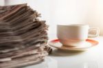 Newspapers And Coffee Stock Photo