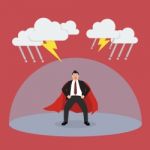 Businessman Superhero With Barrier Protecting From Thunderstorm Stock Photo