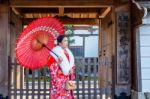 Asian Women Wearing Japanese Traditional Kimono Visiting The Beautiful In Kyoto Stock Photo
