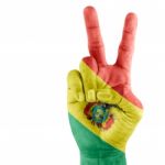 Bolivia State Flag On Victory Hand Stock Photo