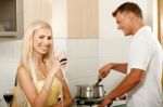 Man Cooking And Smiling Stock Photo