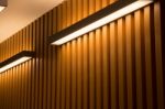 Light On Wooden Plank Wall Stock Photo
