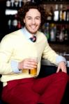 Young Guy Having Chilled Beer At Bar Stock Photo