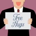 Man Showing Free Hugs Sign Stock Photo