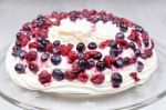 Raspberries And Blueberries Foam Pie On Glass Scale Stock Photo