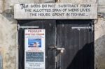 Quotation On A Garage Door At Lyme Regis Harbour Stock Photo