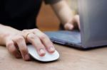 Woman Hands Using Laptop And Wireless Mouse Stock Photo