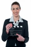 Pretty Business Lady With Clapperboard Stock Photo